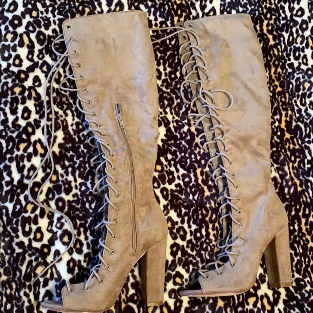 Knee high lace up boots